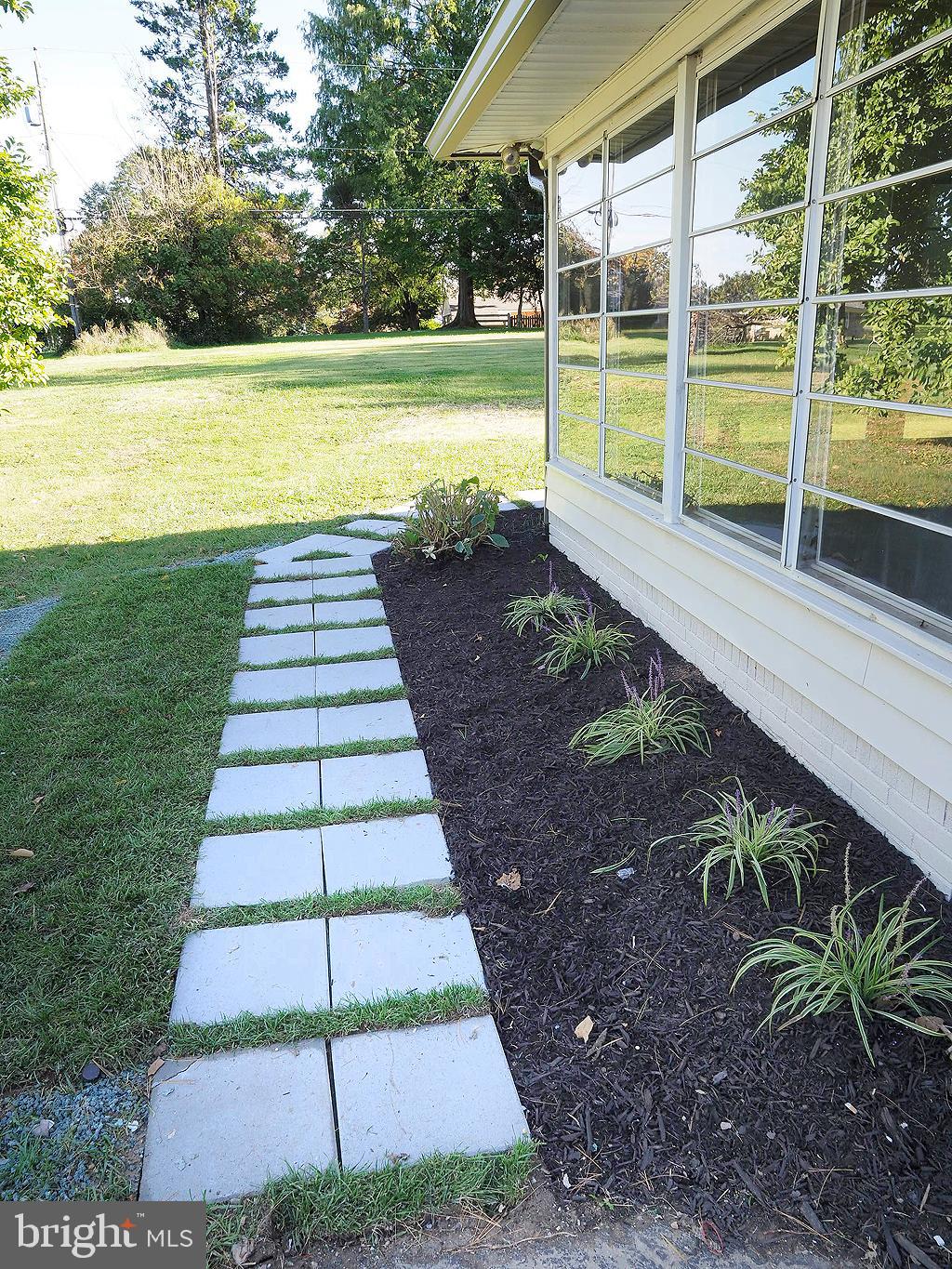 4607 Carroll Manor Road Baldwin, MD 21013 - Photo 43 of 53 New Pavers to the Sun porch