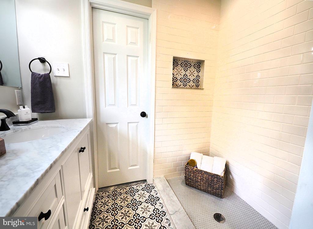 4607 Carroll Manor Road Baldwin, MD 21013 - Photo 6 of 53 Full Primary Bedroom Bath w/ Custom Tile