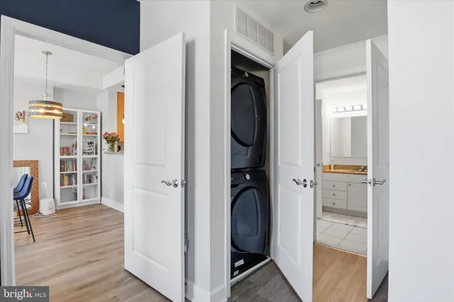 a view of livingroom with hardwood floor and hallway