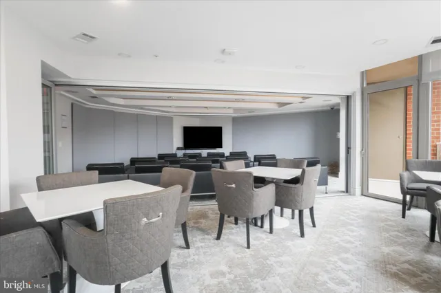 a room with closet and a chair