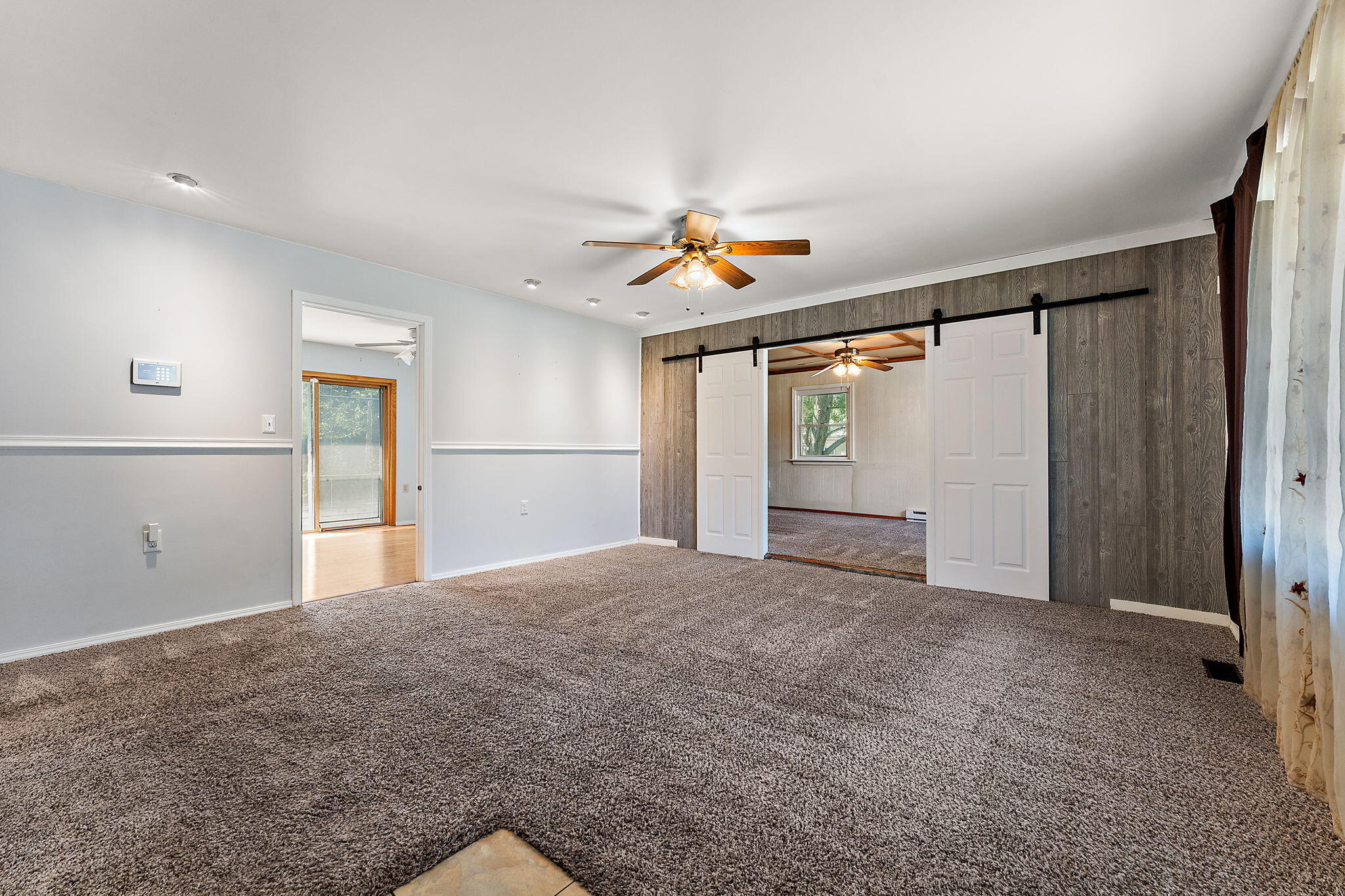 739 Eagle Creek Road Valparaiso, IN 46385 - Photo 4 of 23 a view of an empty room with a window
