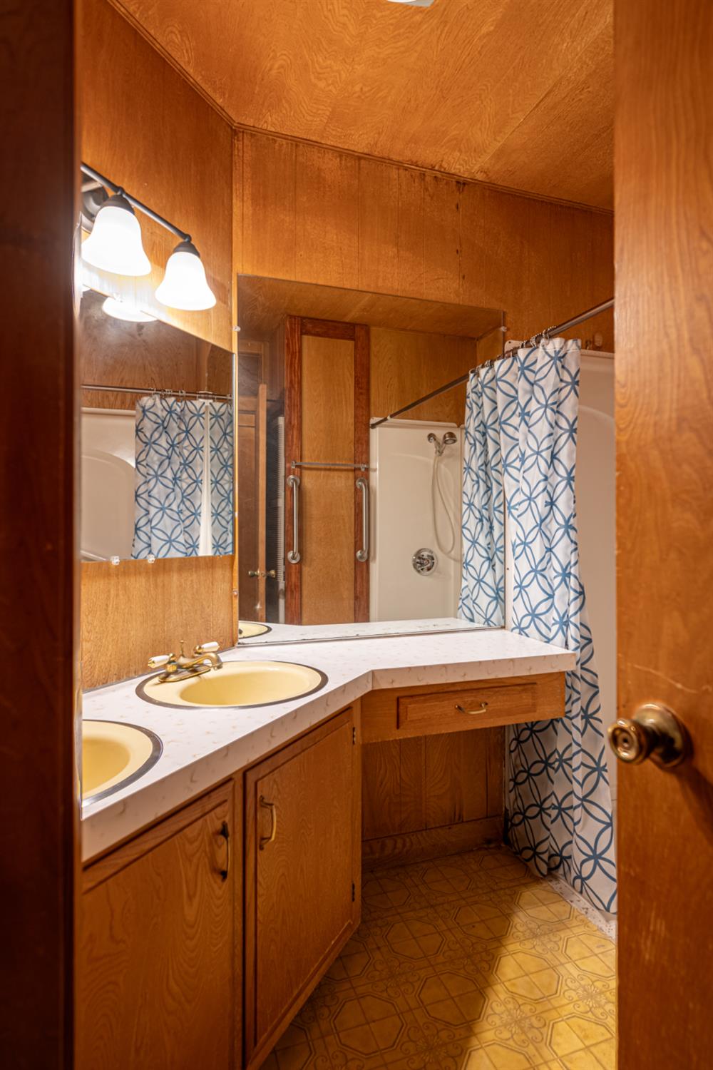 9060 Auburn Folsom Road, Unit 1 Granite Bay, CA 95746 - Photo 15 of 27 a bathroom with a sink and a mirror