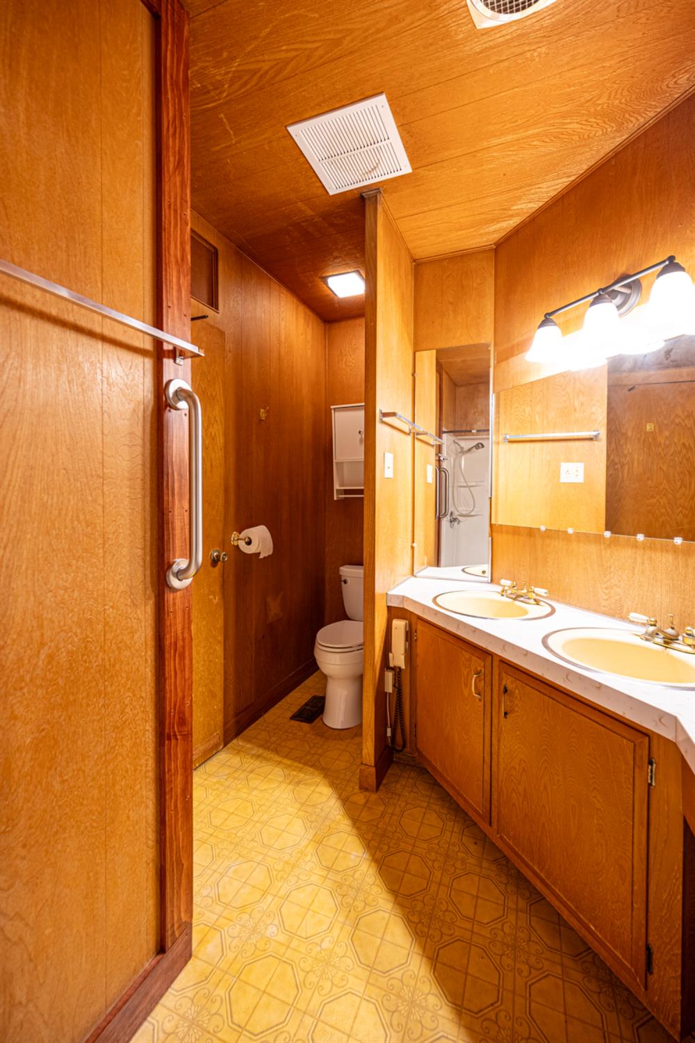 9060 Auburn Folsom Road, Unit 1 Granite Bay, CA 95746 - Photo 17 of 27 a spacious bathroom with a granite countertop sink a toilet and shower