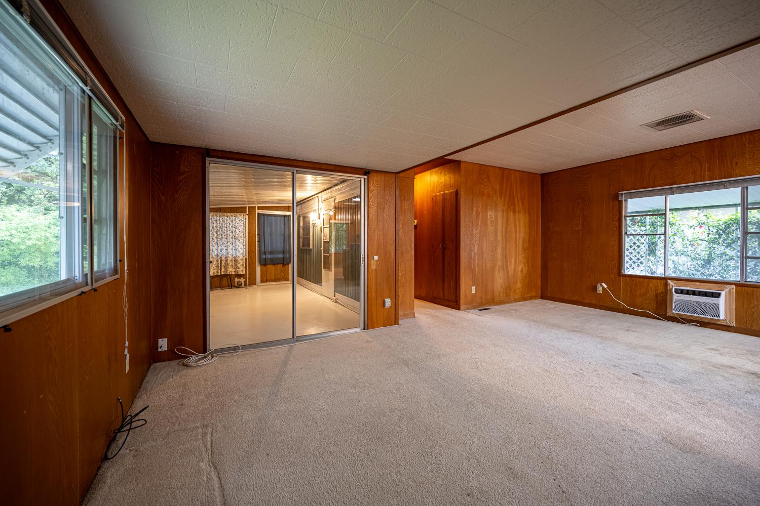 9060 Auburn Folsom Road, Unit 1 Granite Bay, CA 95746 - Photo 7 of 27 a view of an empty room with large windows