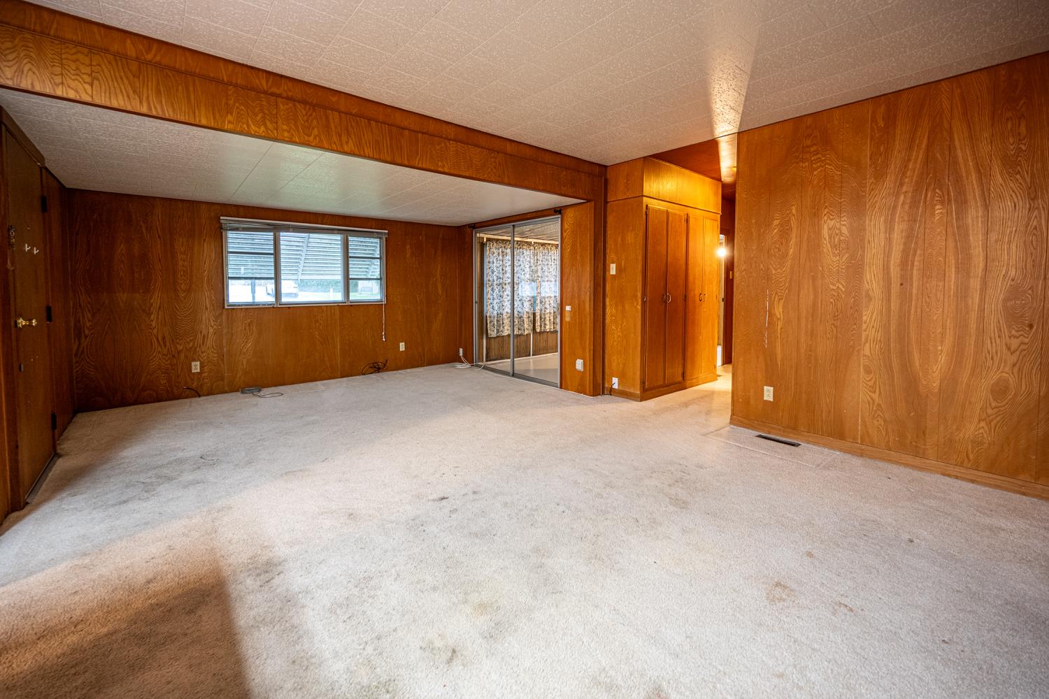 9060 Auburn Folsom Road, Unit 1 Granite Bay, CA 95746 - Photo 9 of 27 an empty room with windows