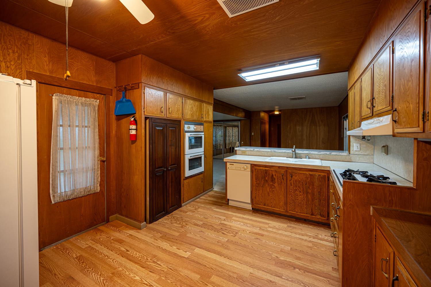 9060 Auburn Folsom Road, Unit 1 Granite Bay, CA 95746 - Photo 10 of 27 a kitchen with stainless steel appliances granite countertop a stove a sink and a refrigerator