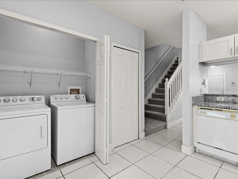 29924 Playa Del Rey Lane Wesley Chapel, FL 33543 - Photo 22 of 31 a view of storage and utility room with washer and dryer