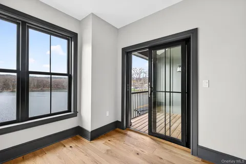 a view of a room that has a large window