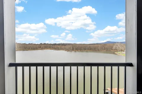 a view of city and a balcony