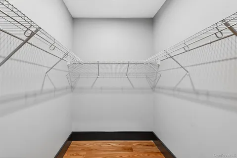 a view of a room with racks on the wall