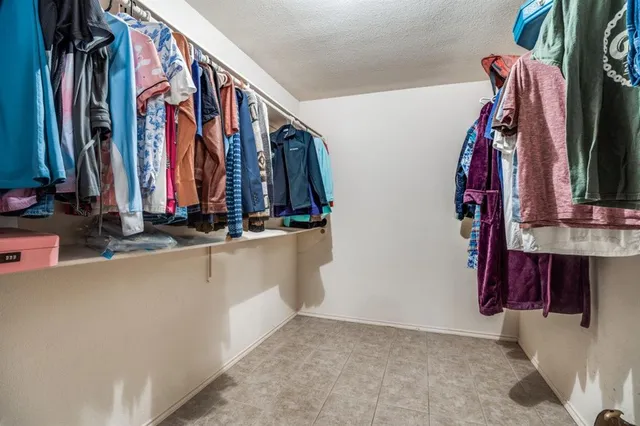 a room with cabinets and furniture