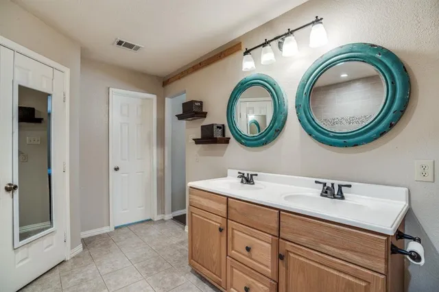 a bathroom with a toilet and a sink