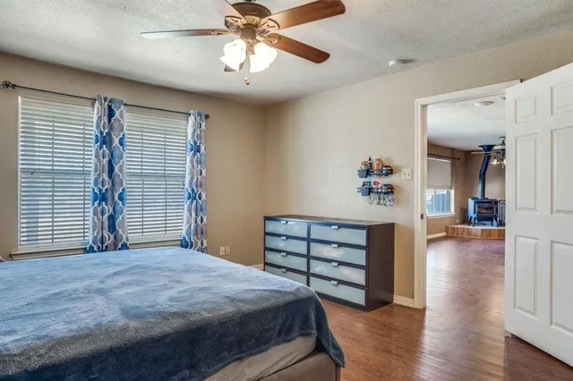 a view of walk in closet with clothes
