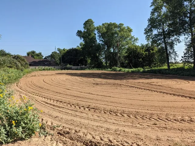 a view of a swimming pool and an outdoor space