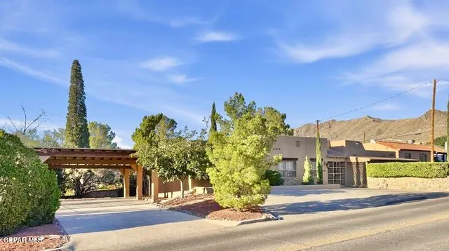 a view of a building with a street