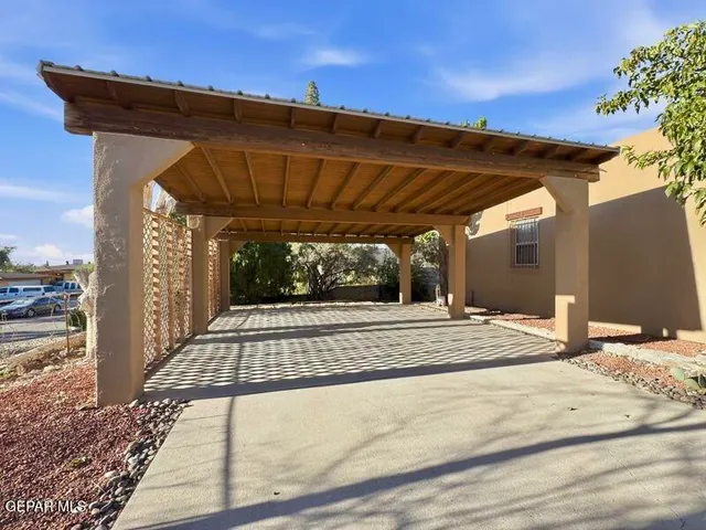 a view of a backyard of the house