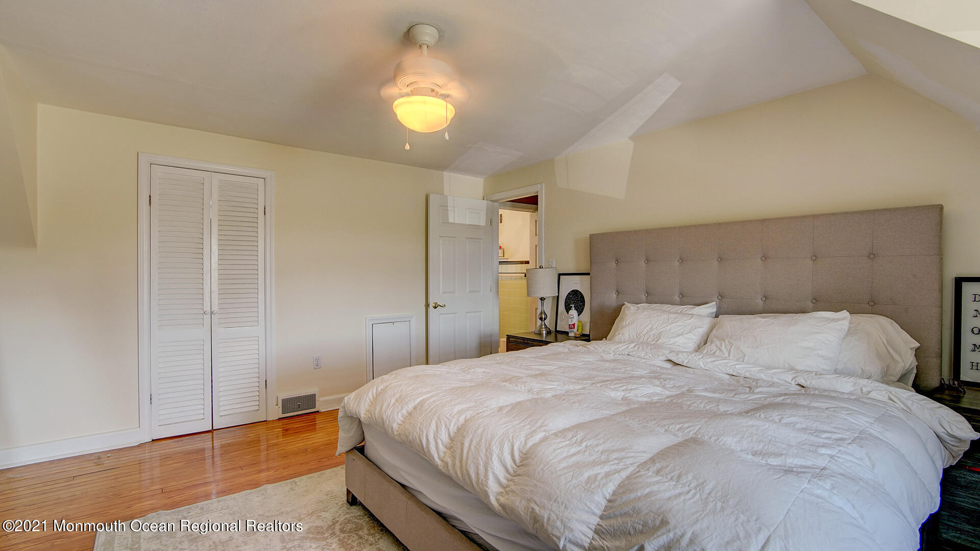 102 Wilburtha Road Ewing, NJ 08628 - Photo 25 of 30 a bedroom with a bed and painting on the wall