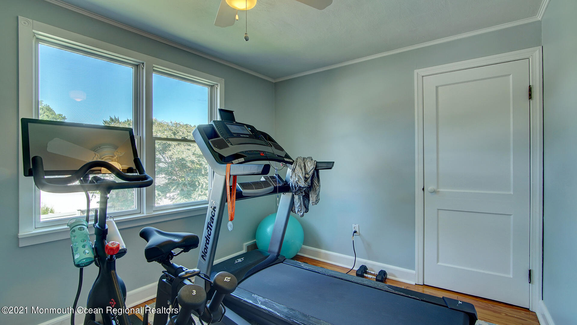 102 Wilburtha Road Ewing, NJ 08628 - Photo 29 of 30 a room with gym equipment and windows