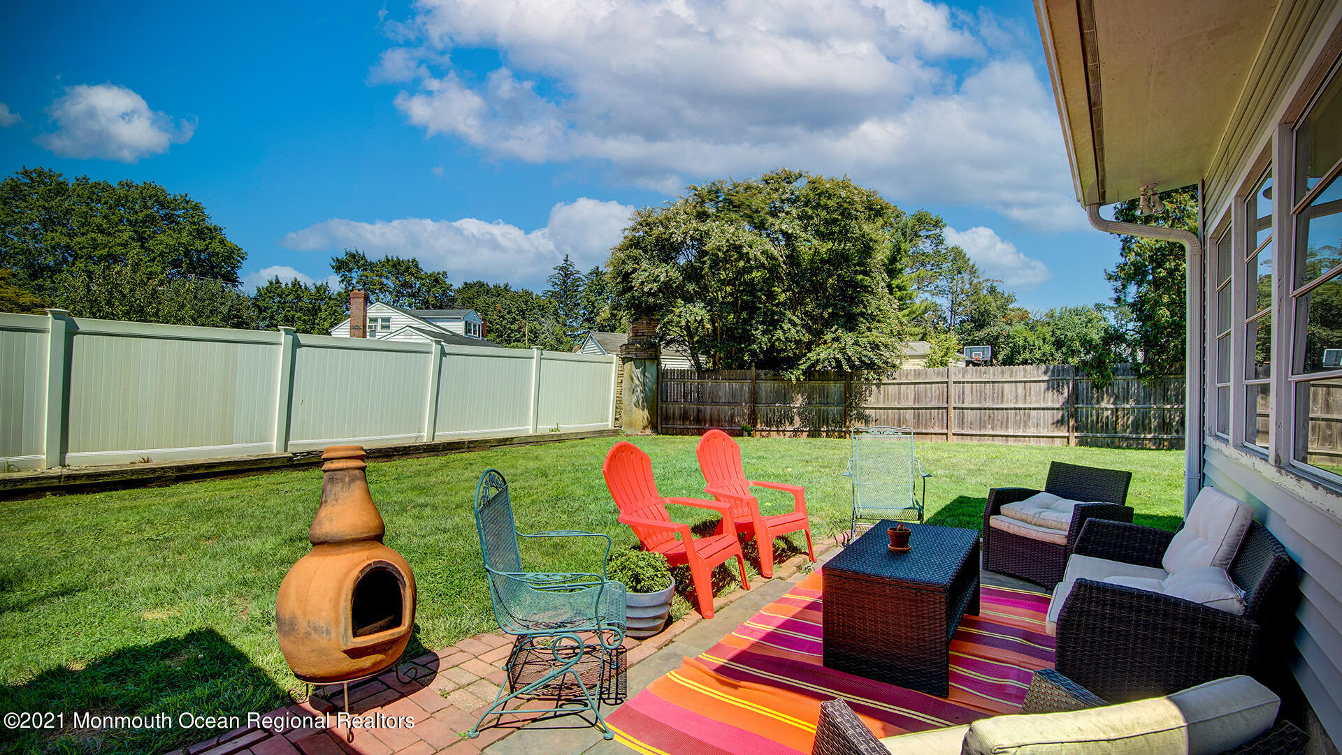 102 Wilburtha Road Ewing, NJ 08628 - Photo 8 of 30 a backyard of a house with table and chairs