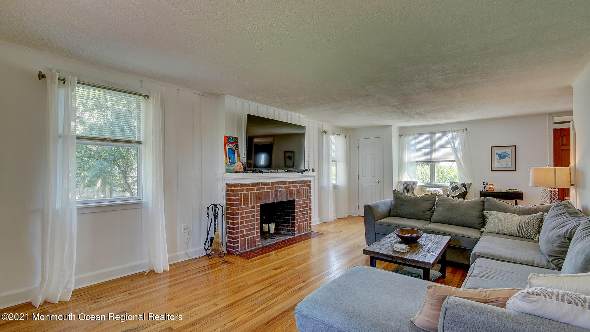 102 Wilburtha Road Ewing, NJ 08628 - Photo 10 of 30 a living room with furniture and a fireplace