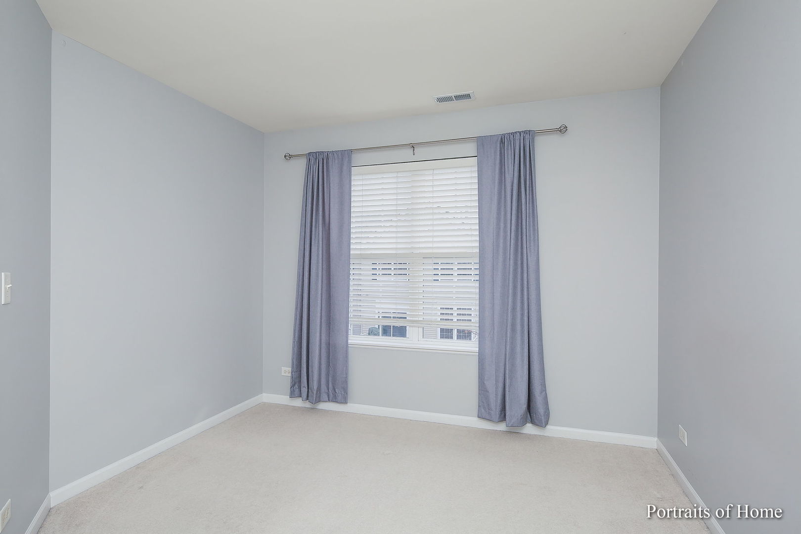 126 Jackson Street Gilberts, IL 60136 - Photo 18 of 25 a view of an empty room with a window
