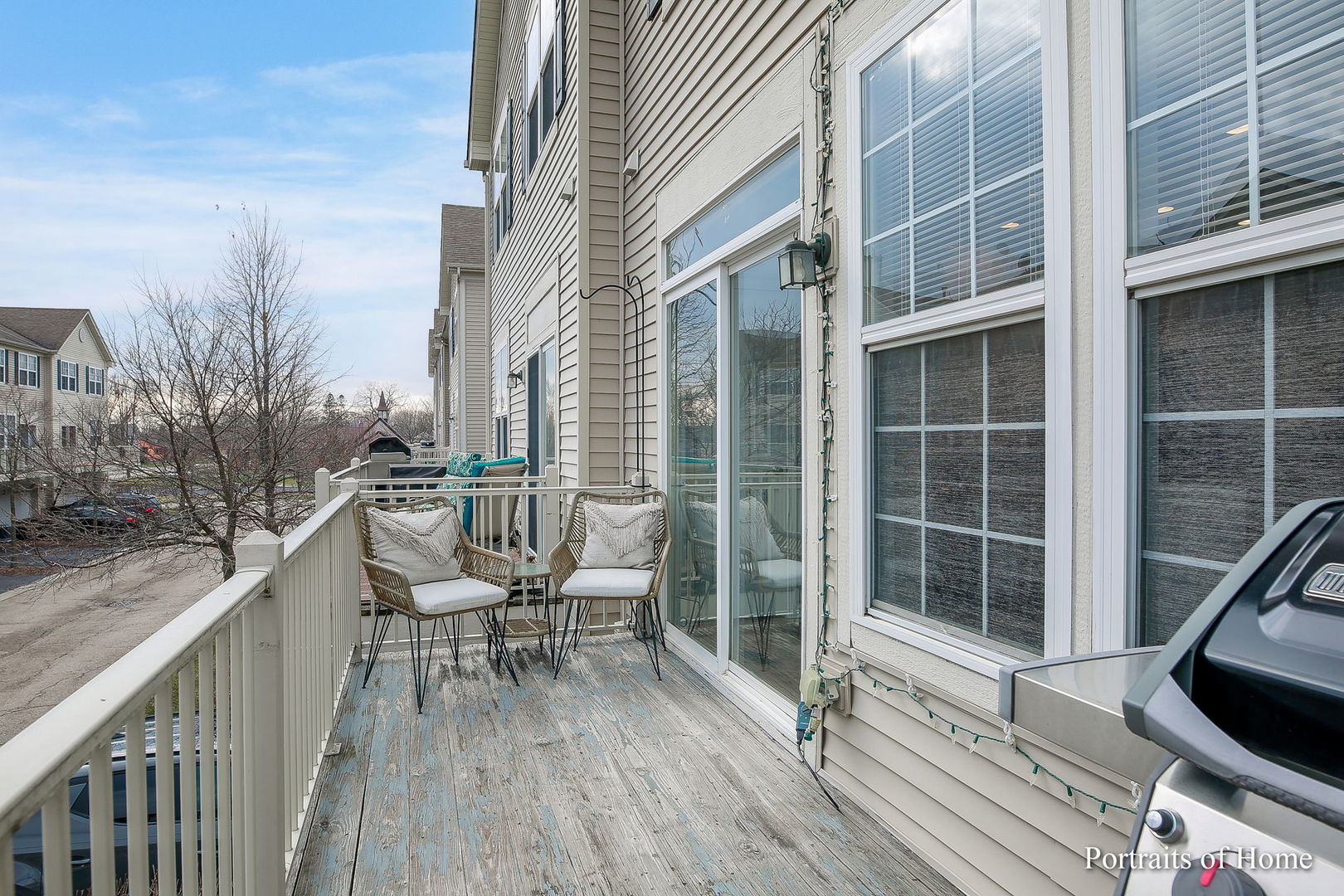 126 Jackson Street Gilberts, IL 60136 - Photo 23 of 25 a balcony with table and chairs