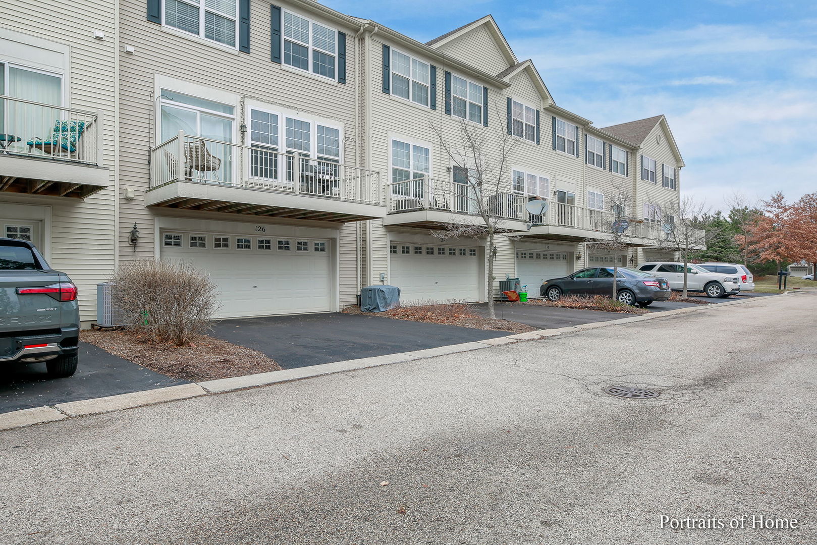 126 Jackson Street Gilberts, IL 60136 - Photo 24 of 25 a view of a street that has couple of cars parked on the road