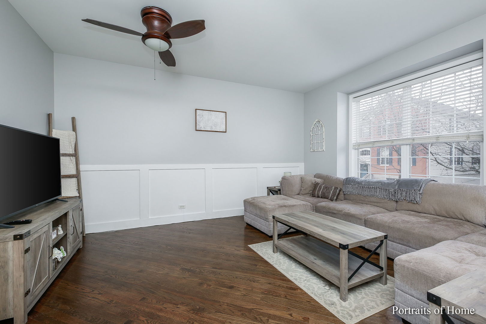 126 Jackson Street Gilberts, IL 60136 - Photo 4 of 25 a living room with furniture and a flat screen tv