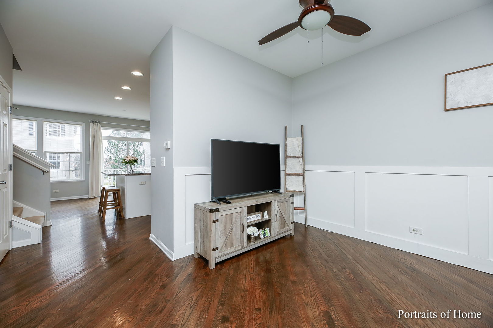 126 Jackson Street Gilberts, IL 60136 - Photo 5 of 25 a living room with furniture and a flat screen tv