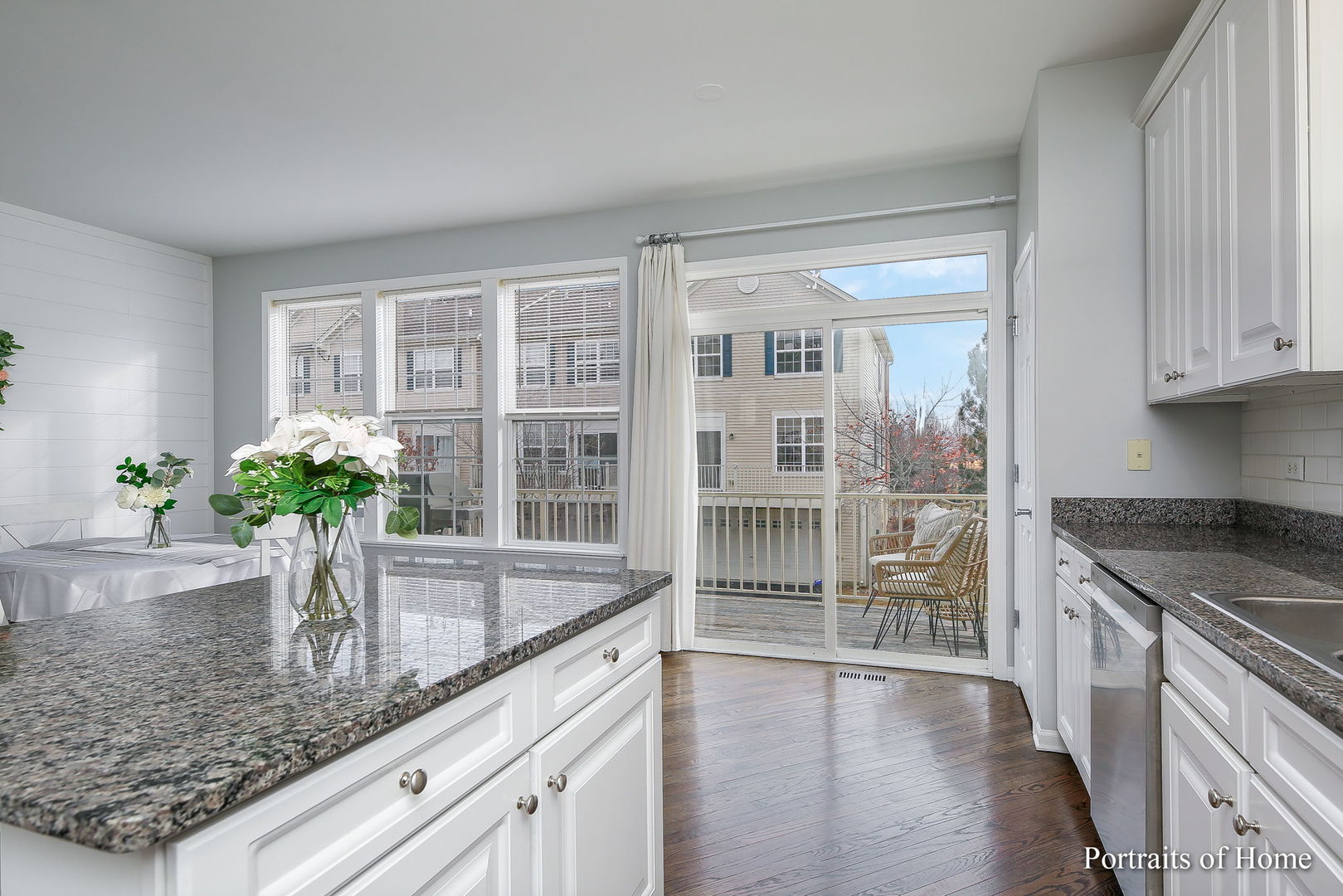 126 Jackson Street Gilberts, IL 60136 - Photo 7 of 25 a kitchen with granite countertop a sink and a stove