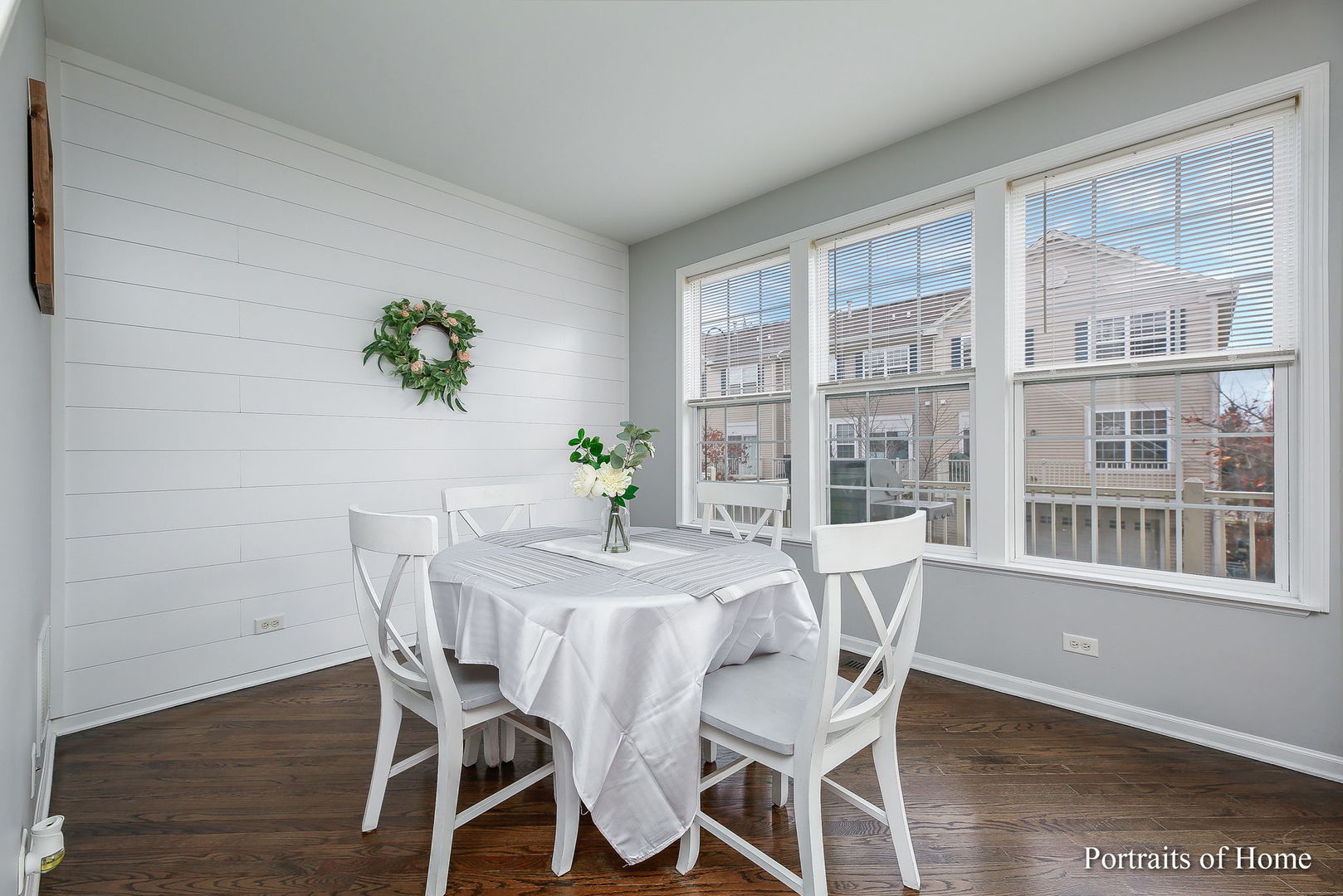 126 Jackson Street Gilberts, IL 60136 - Photo 10 of 25 a view of a dining room with furniture window and wooden floor