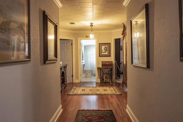 a bathroom with a mirror and a shower