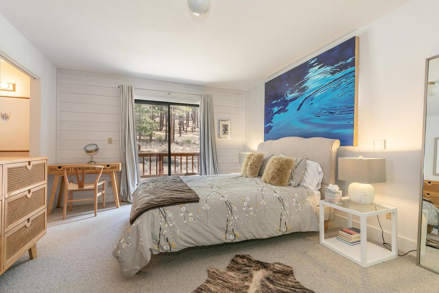 326 Skidder Trail Truckee, CA 96161 - Photo 15 of 21 a bedroom with a bed and a dresser next to a window