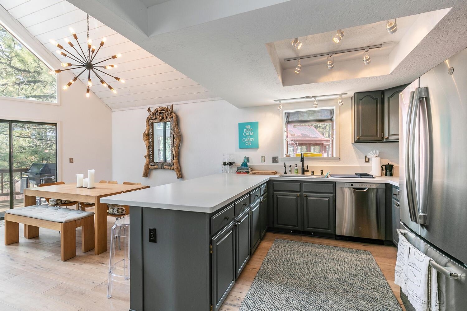 326 Skidder Trail Truckee, CA 96161 - Photo 8 of 21 a kitchen with a sink stove and refrigerator