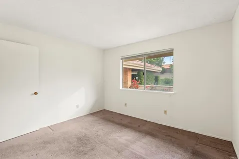 an empty room with window