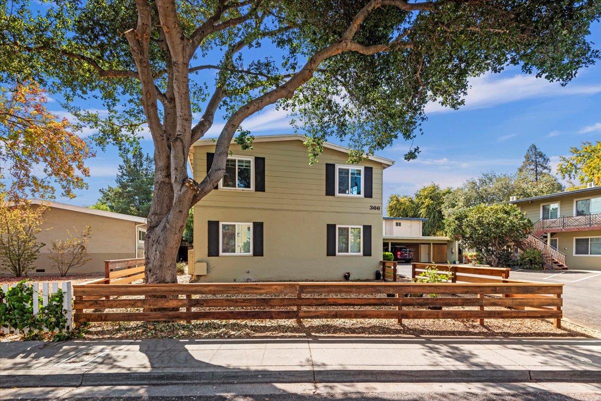 366 Camille Court Mountain View, CA 94040 - Photo 13 of 72 a view of a house with a tree next to a yard
