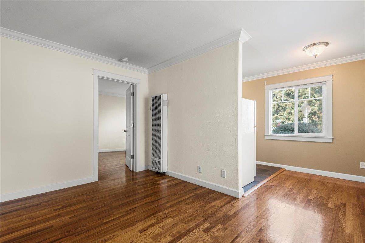 366 Camille Court Mountain View, CA 94040 - Photo 21 of 72 an empty room with wooden floor and windows
