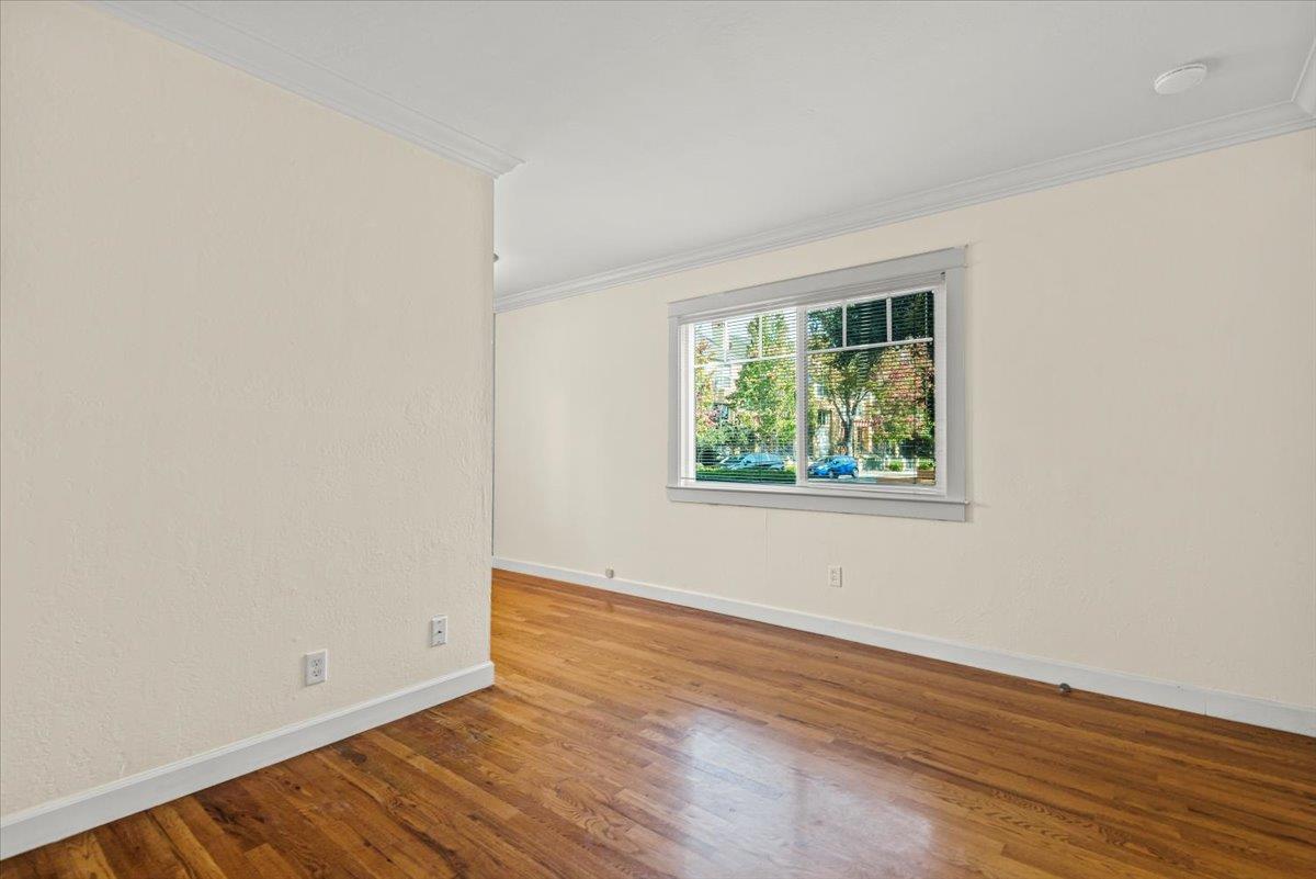 366 Camille Court Mountain View, CA 94040 - Photo 22 of 72 an empty room with wooden floor and windows