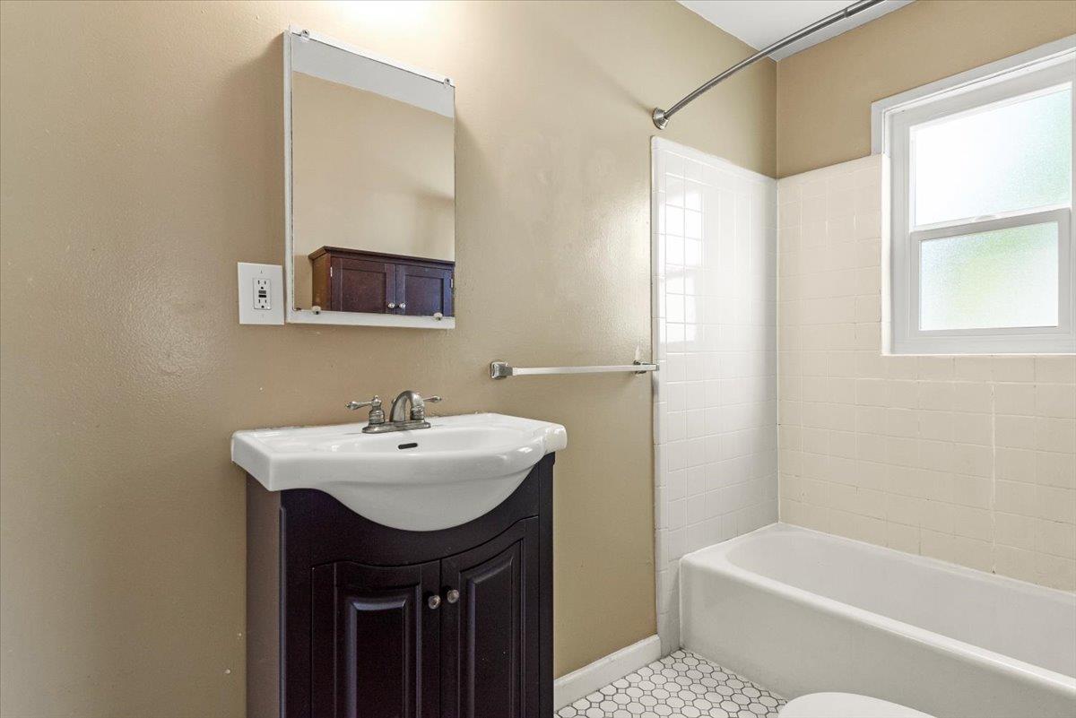 366 Camille Court Mountain View, CA 94040 - Photo 25 of 72 a bathroom with a sink a mirror and a bathtub