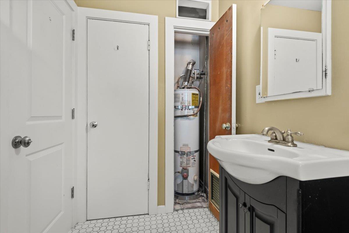 366 Camille Court Mountain View, CA 94040 - Photo 28 of 72 a bathroom with a sink a mirror and a toilet