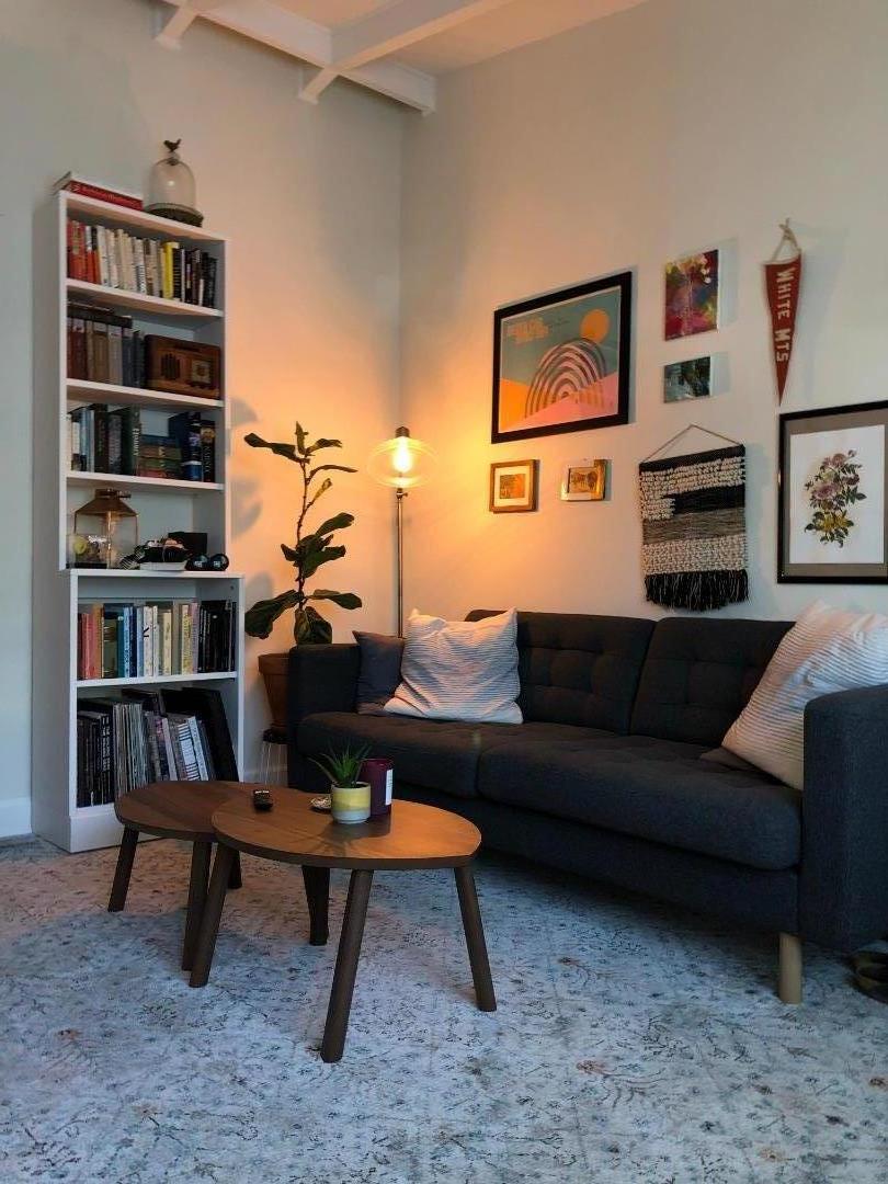 366 Camille Court Mountain View, CA 94040 - Photo 29 of 72 a living room with furniture a rug and a book shelf