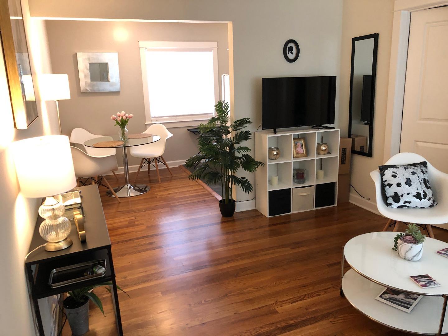 366 Camille Court Mountain View, CA 94040 - Photo 30 of 72 a living room with furniture and a flat screen tv