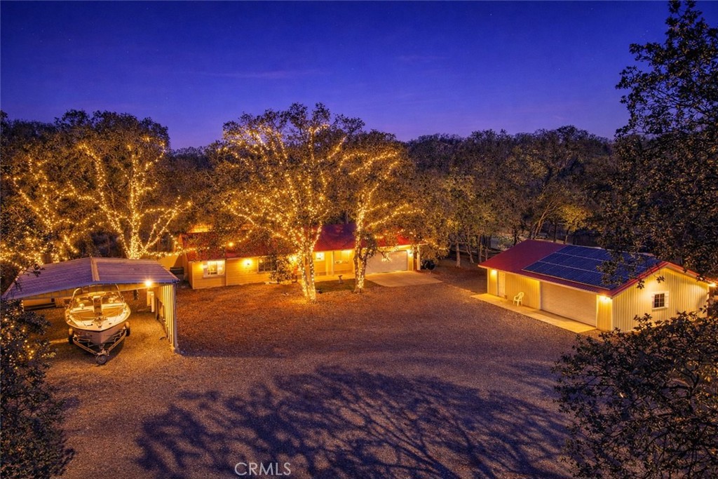 18601 Stallion Drive Red Bluff, CA 96080 - Photo 1 of 1 a view of a yard with a tree