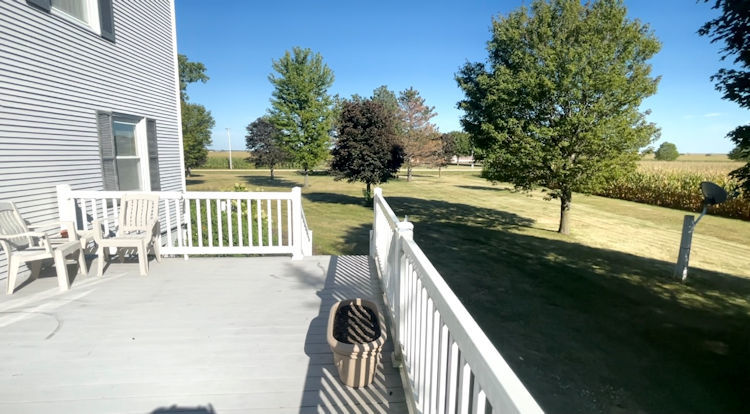 906 South Chamberlain Road Esmond, IL 60129 - Photo 15 of 19 a balcony with table and chairs
