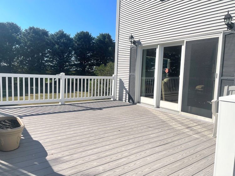 906 South Chamberlain Road Esmond, IL 60129 - Photo 16 of 19 a white house with wooden floor and seating space