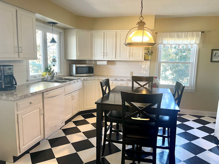 906 South Chamberlain Road Esmond, IL 60129 - Photo 3 of 19 a view of a dining room with furniture and windows