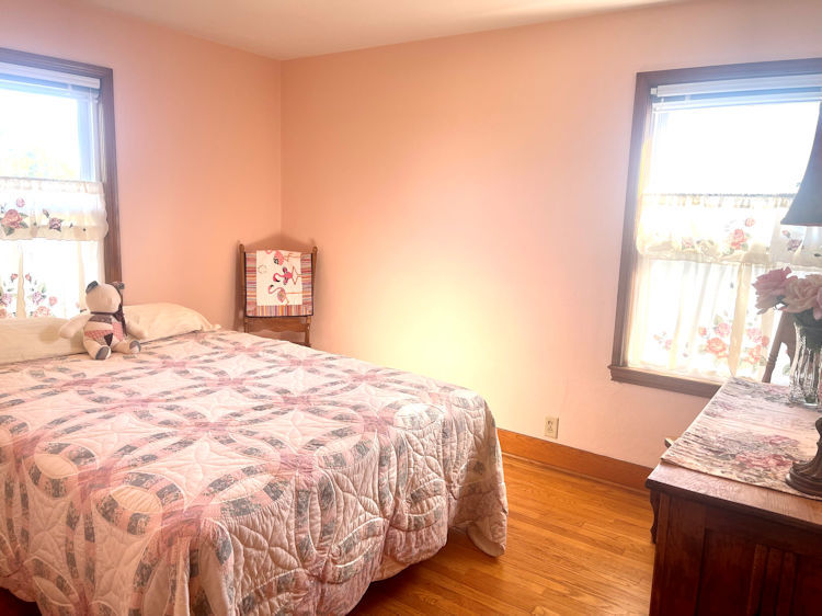 906 South Chamberlain Road Esmond, IL 60129 - Photo 8 of 19 a bedroom with a bed and a window