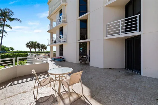a living room with a sink and a mirror