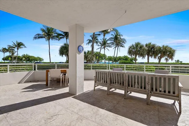 a sitting area with furniture and garden view
