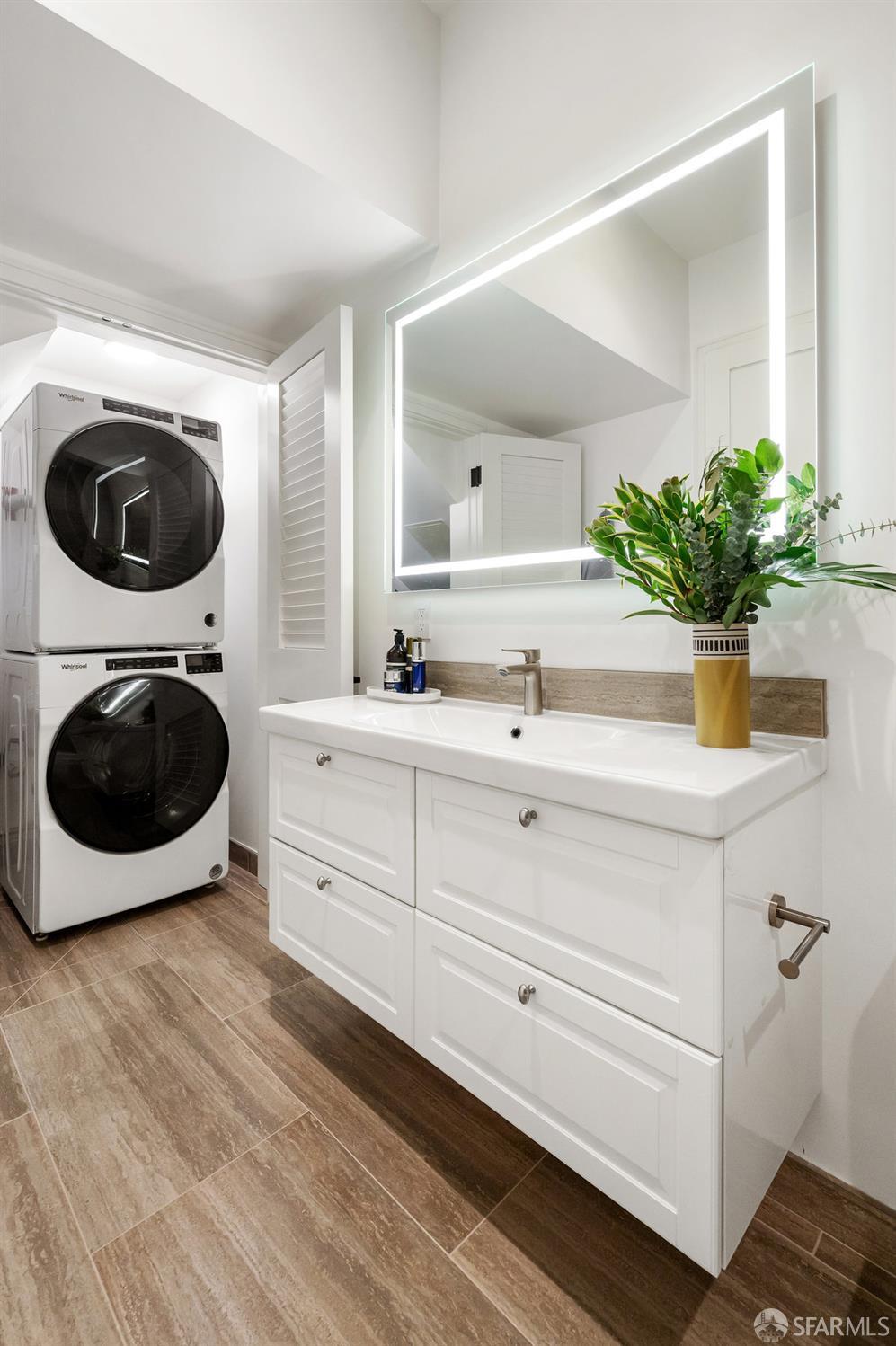 150 Eureka Street, Unit A San Francisco, CA 94114 - Photo 27 of 60 a bathroom with a sink a mirror and shower